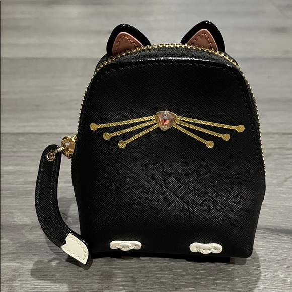 kate spade Accessories - kate spade NWOT black cat-shaped mini coin purse with gold accents